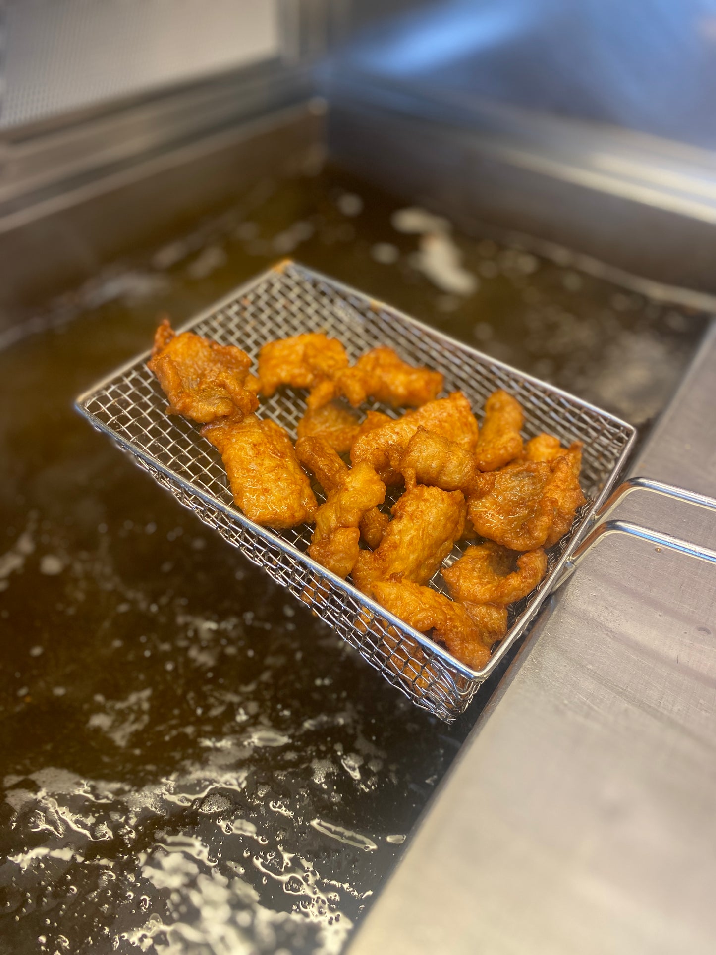 Gebakken kibbeling in zak